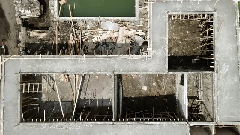 Aerial view of foundations and ground floor walls on a building site in Bali