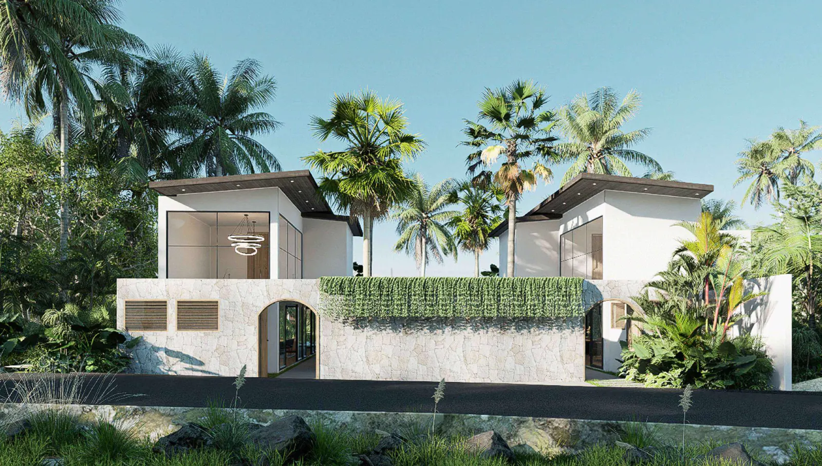 A rendered villa entrance with arched openings and tropical planting